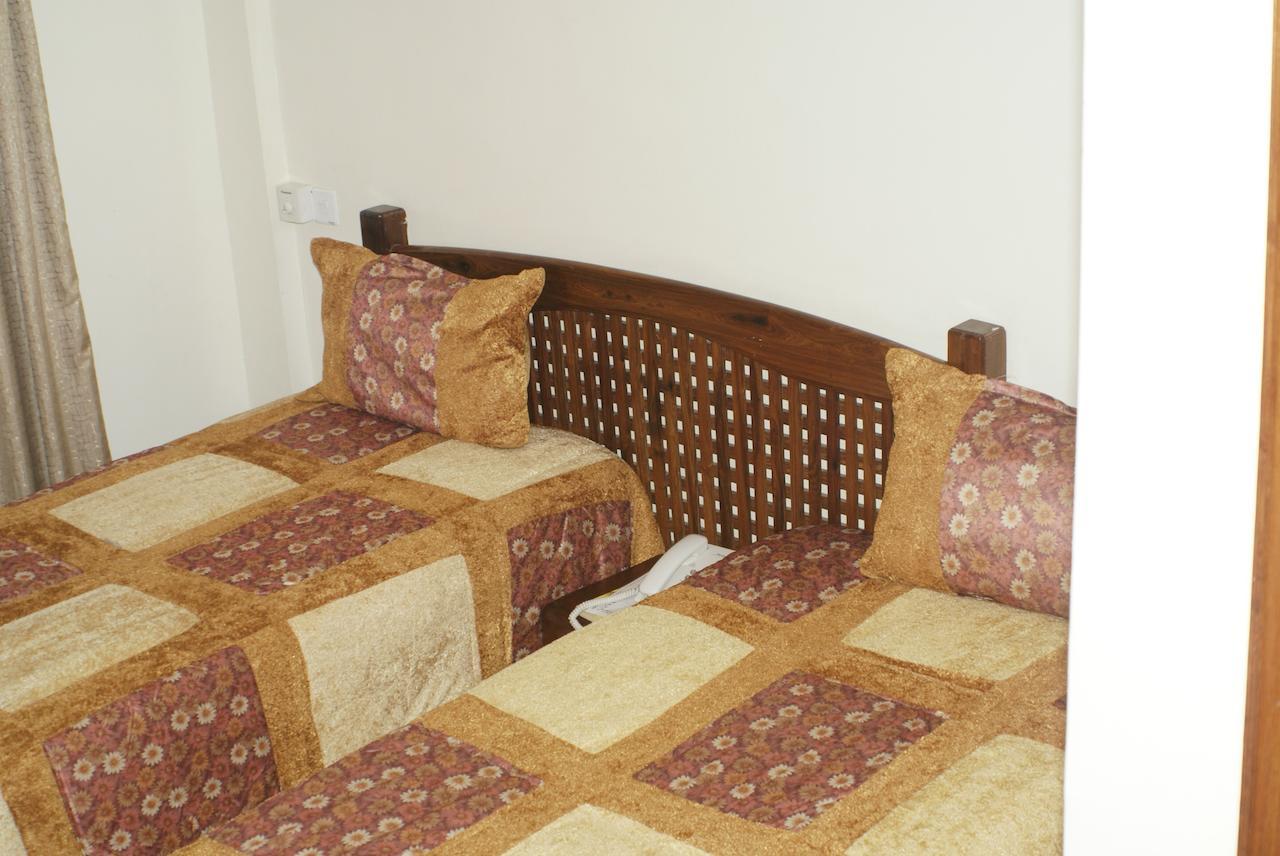 Briston Hotel Arusha Zimmer foto